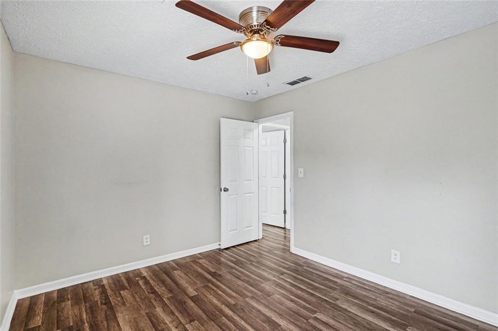 6221 Amberly Road Rex, GA 30273 - Photo 10 of 17 wooden floor in an empty room