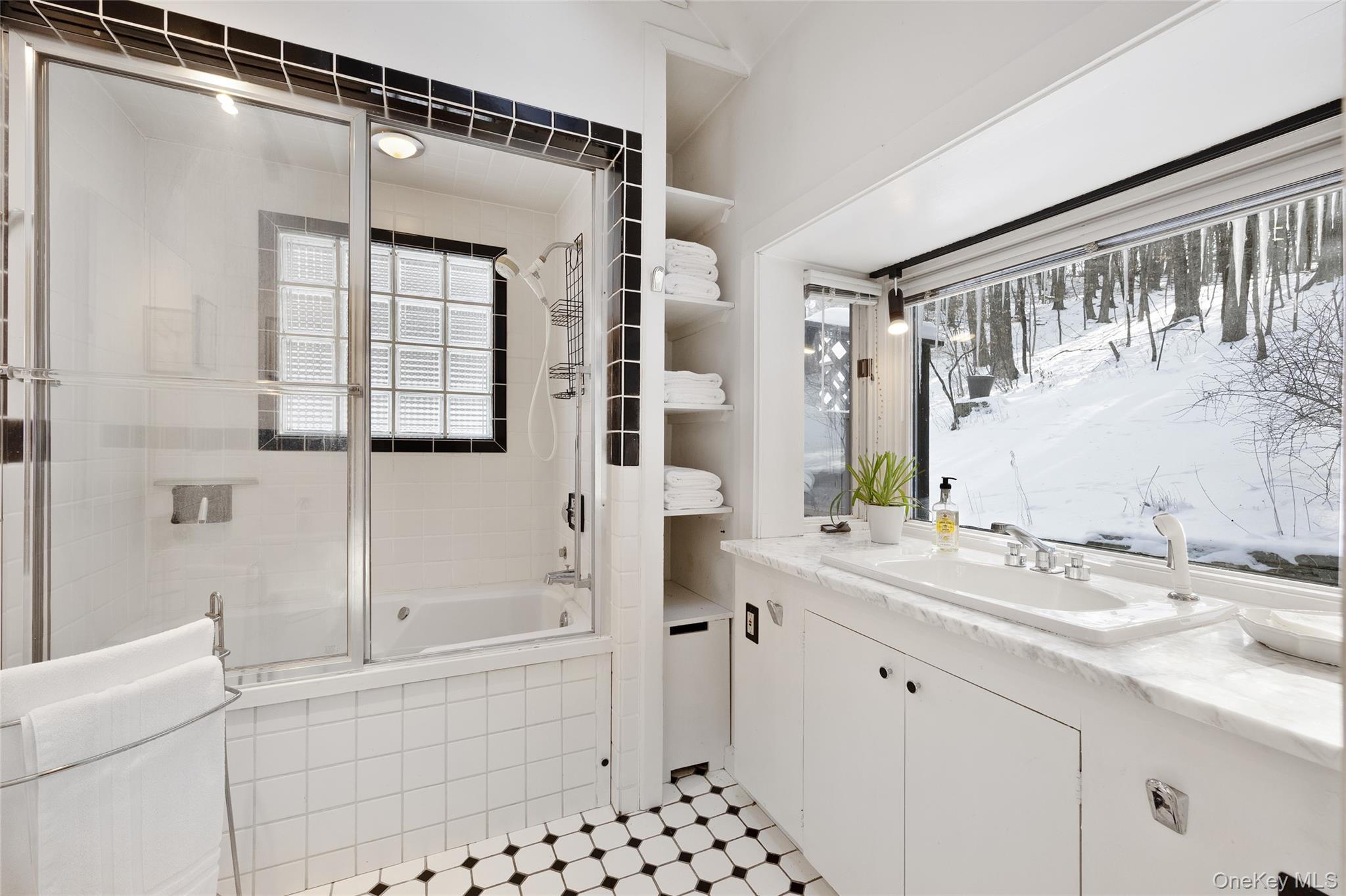 326 Pratt Hill Road Austerlitz, NY 12037 - Photo 19 of 31 a bathroom with a bathtub sink vanity and mirror