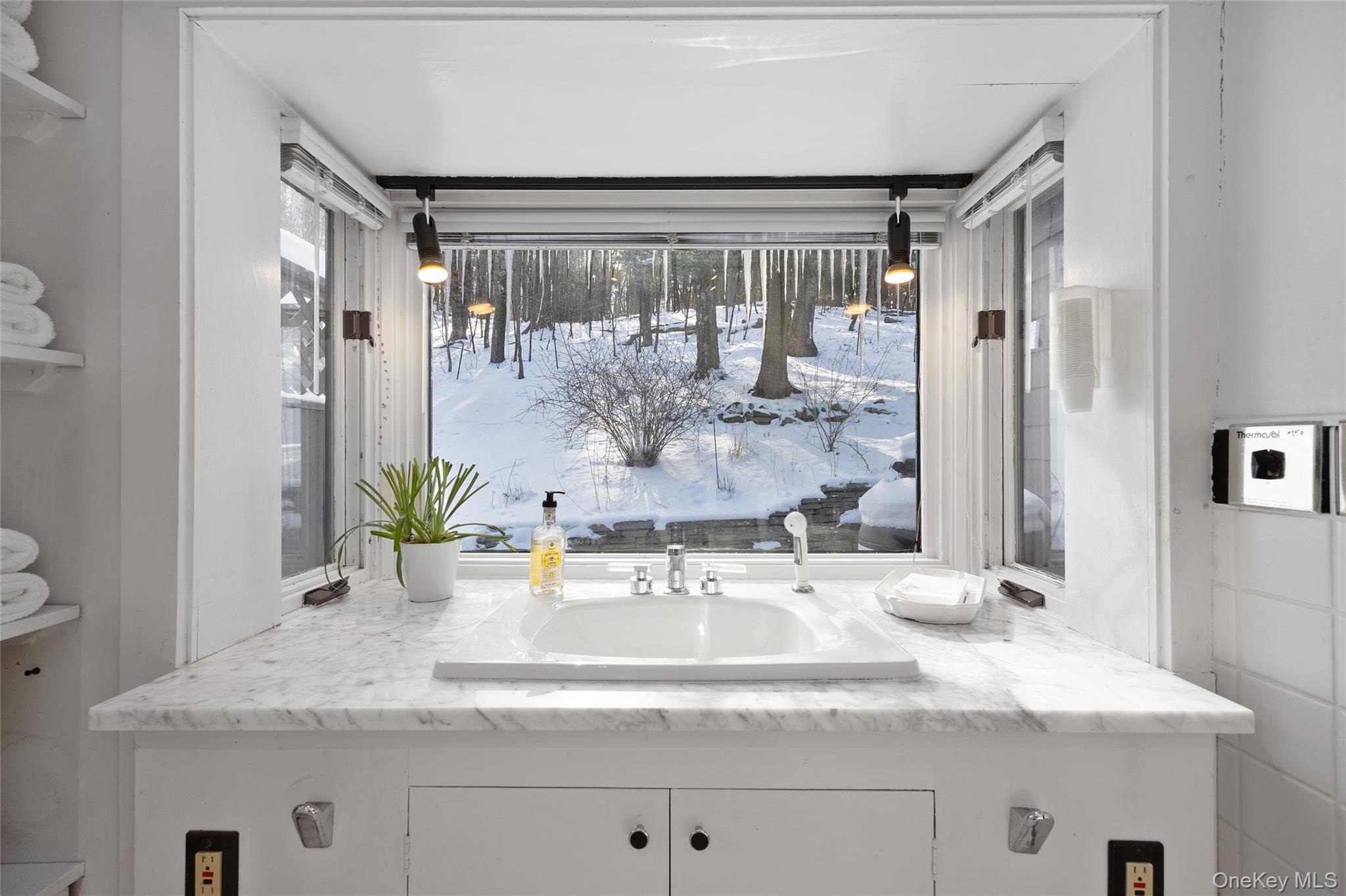 326 Pratt Hill Road Austerlitz, NY 12037 - Photo 20 of 31 a bathroom with a granite countertop sink and a mirror