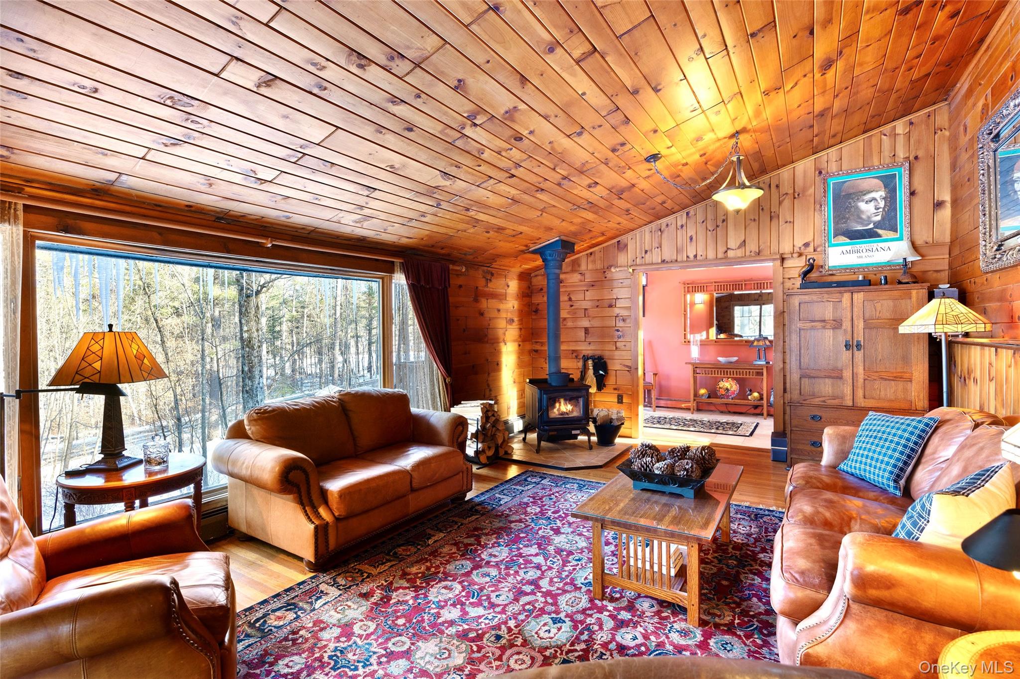 326 Pratt Hill Road Austerlitz, NY 12037 - Photo 5 of 31 a living room with furniture and a large window