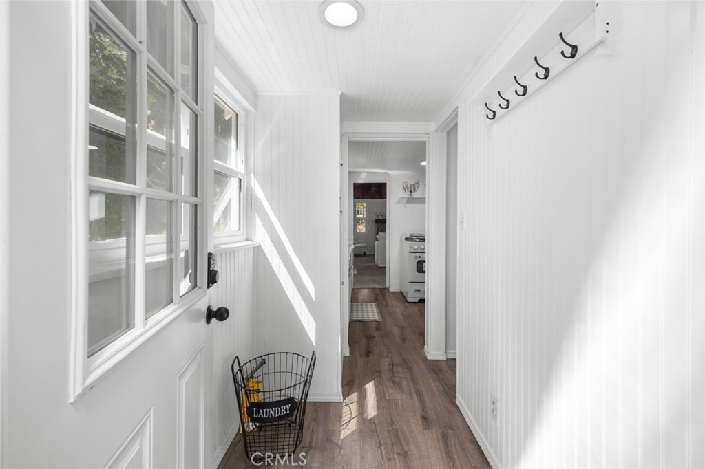 1177 Bear Springs Road Rimforest, CA 92378 - Photo 16 of 37 a view of entryway with wooden floor and stairs