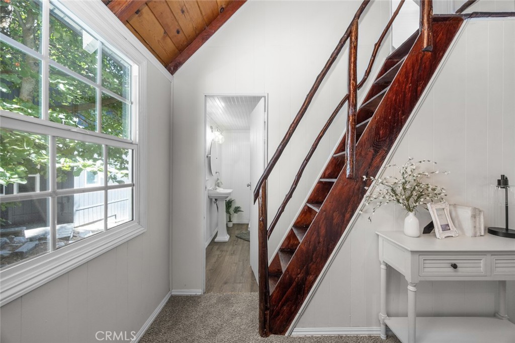 1177 Bear Springs Road Rimforest, CA 92378 - Photo 20 of 37 a view of an entryway with wooden floor