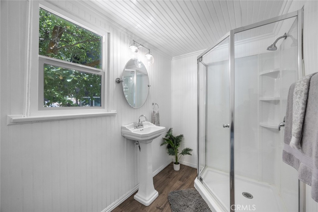 1177 Bear Springs Road Rimforest, CA 92378 - Photo 22 of 37 a bathroom with a sink and a mirror