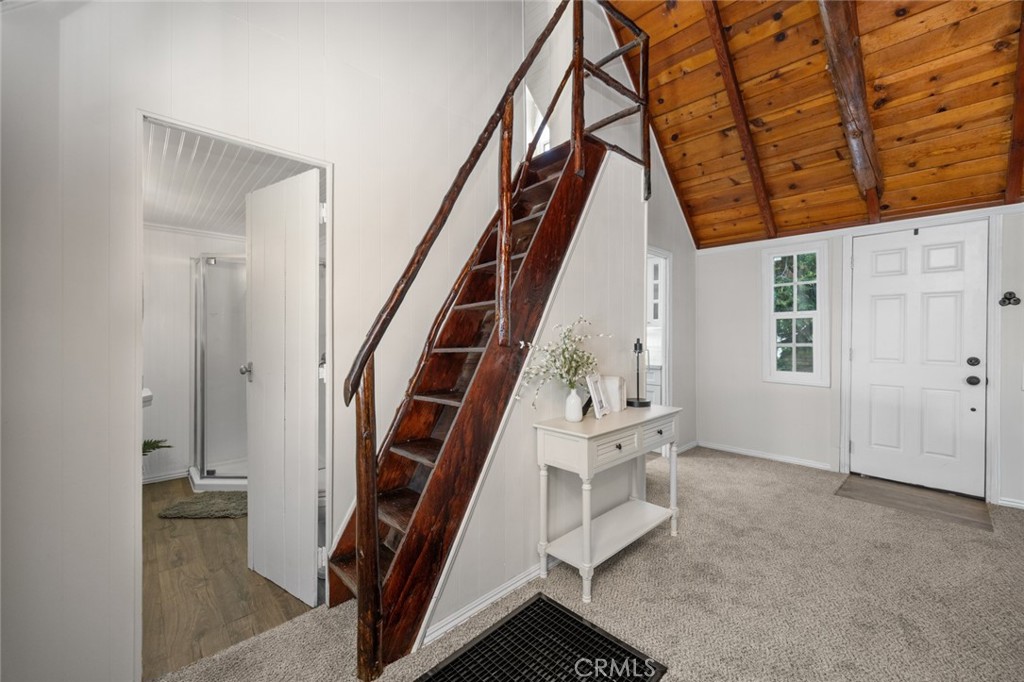 1177 Bear Springs Road Rimforest, CA 92378 - Photo 24 of 37 a view of an entryway with staircase