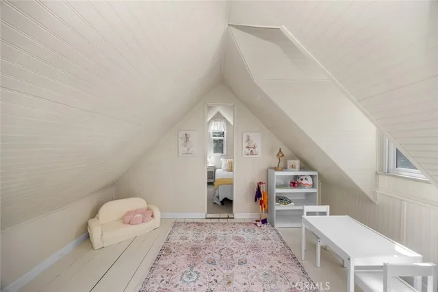 a living room with furniture and window