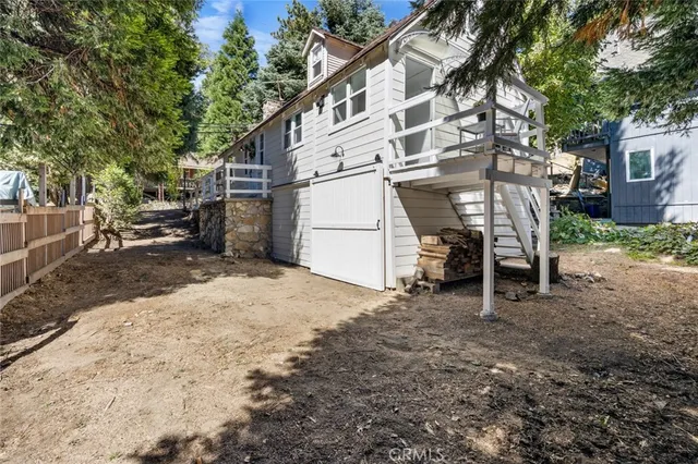 a view of backyard with a table and chair