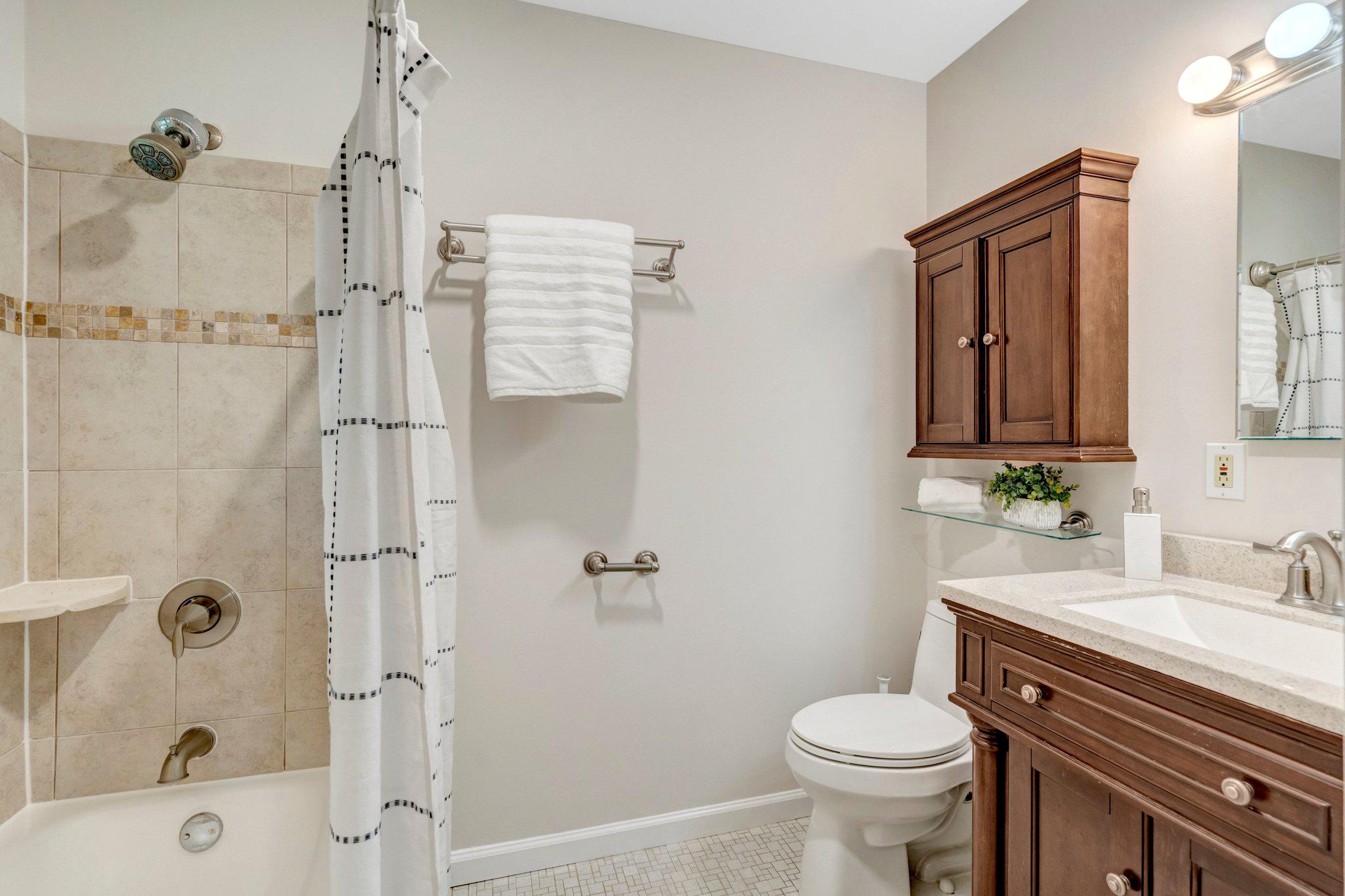 8213 Springfield Village Drive Springfield, VA 22152 - Photo 15 of 25 Primary bathroom with refinished tub