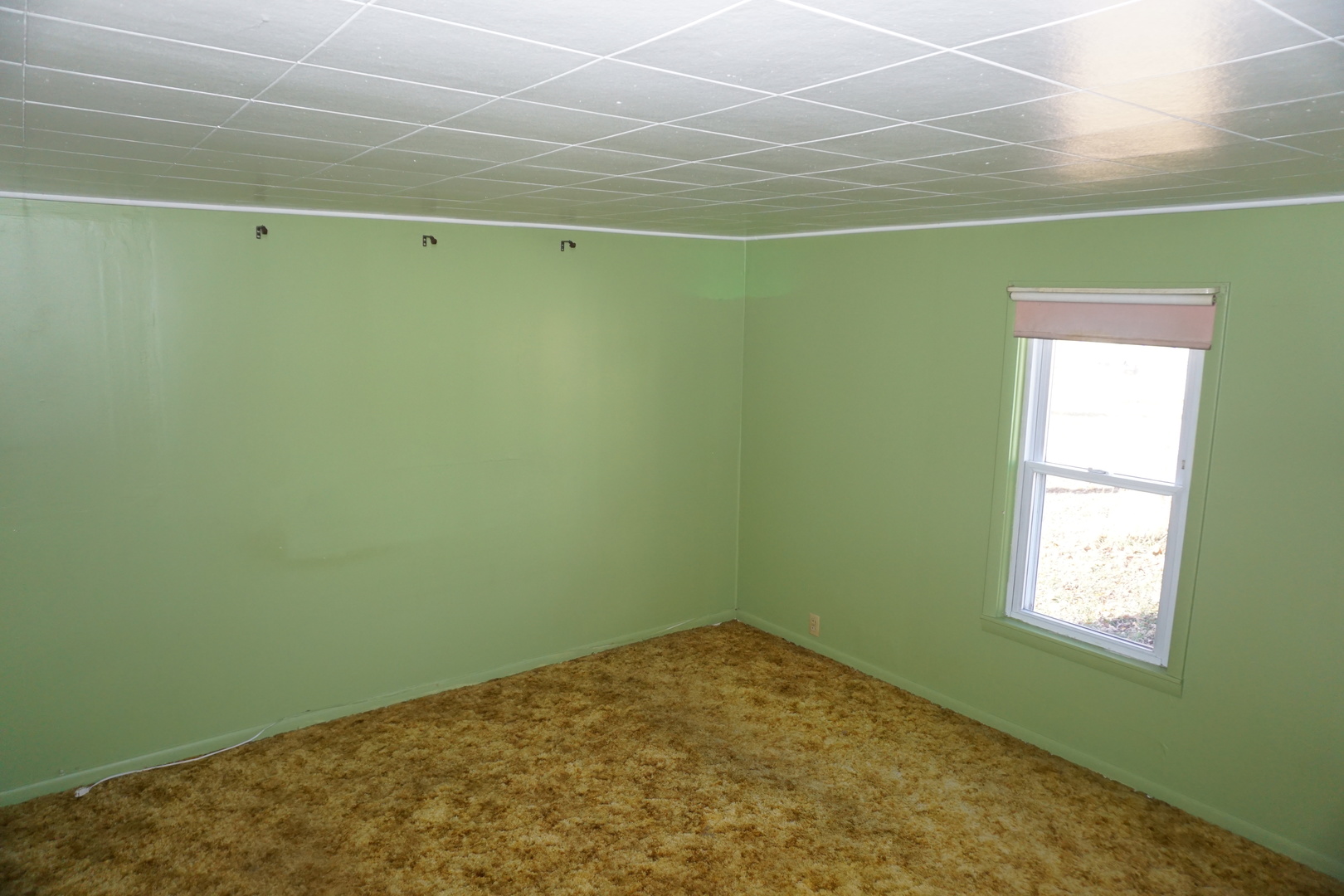 5317A South 2000W Road Chebanse, IL 60922 - Photo 6 of 14 a view of a room with rack on the wall and a window
