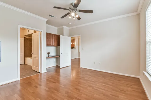 a view of a livingroom with wooden floor