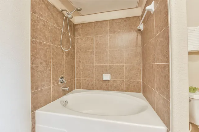 a bathroom with a bathtub