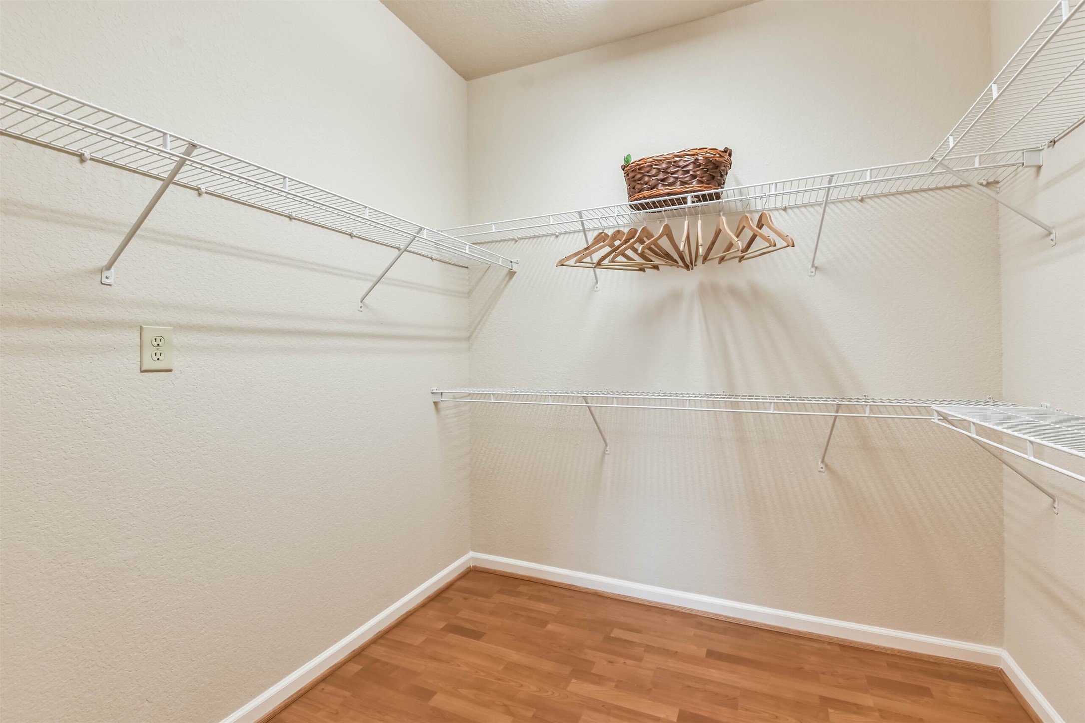 1711 Old Spanish Trail, Unit 406 Houston, TX 77054 - Photo 19 of 30 a view of a room with racks on the wall