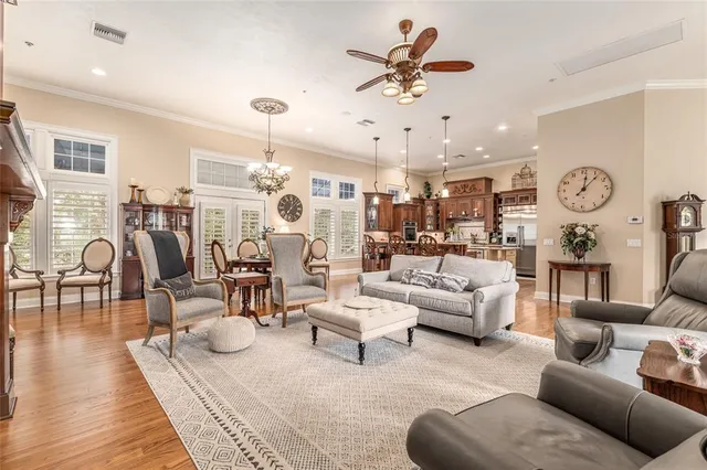 a kitchen with stainless steel appliances granite countertop a refrigerator stove and oven