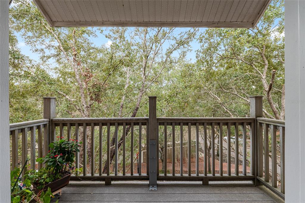 5015 Southwest 91 Terrace Gainesville, FL 32608 - Photo 16 of 61 a view of a balcony with wooden floor