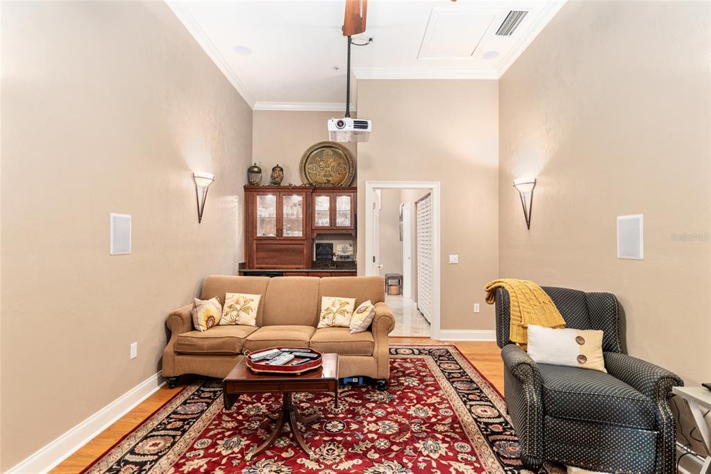 5015 Southwest 91 Terrace Gainesville, FL 32608 - Photo 30 of 61 a living room with furniture and wooden floor