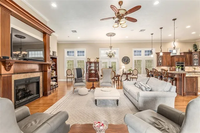 a large kitchen with a table and chairs
