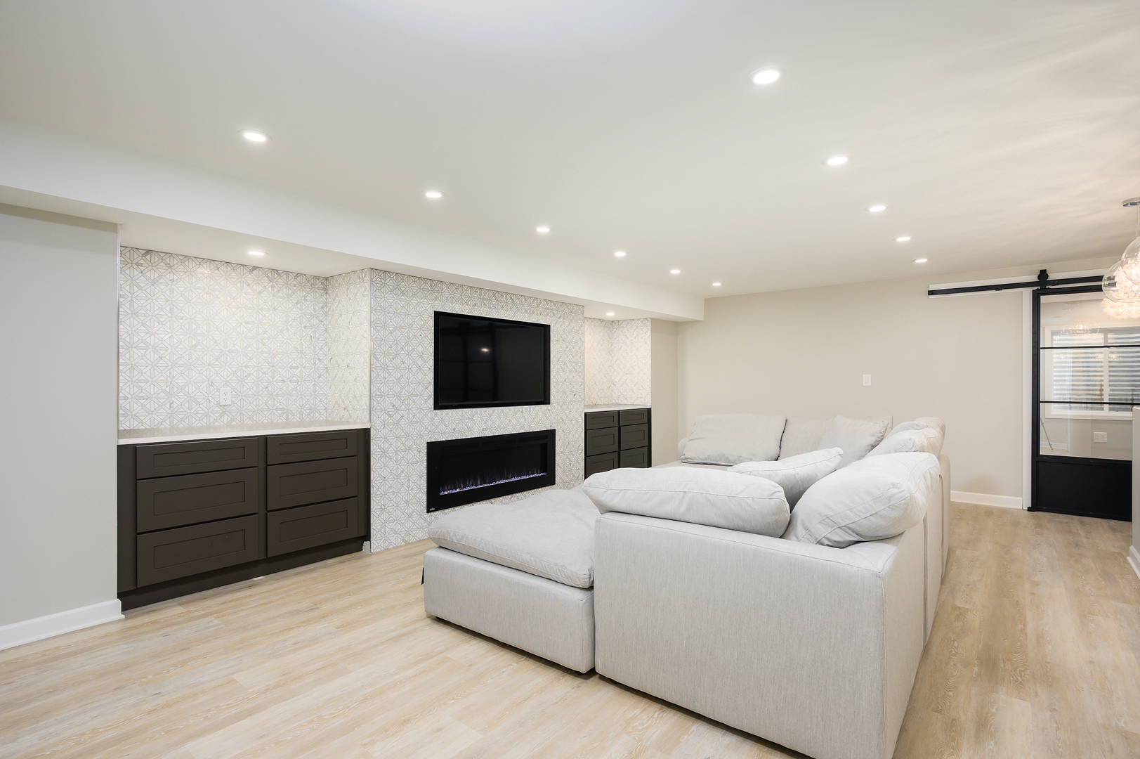 232 North Addison Avenue Elmhurst, IL 60126 - Photo 16 of 28 a living room with furniture and a flat screen tv