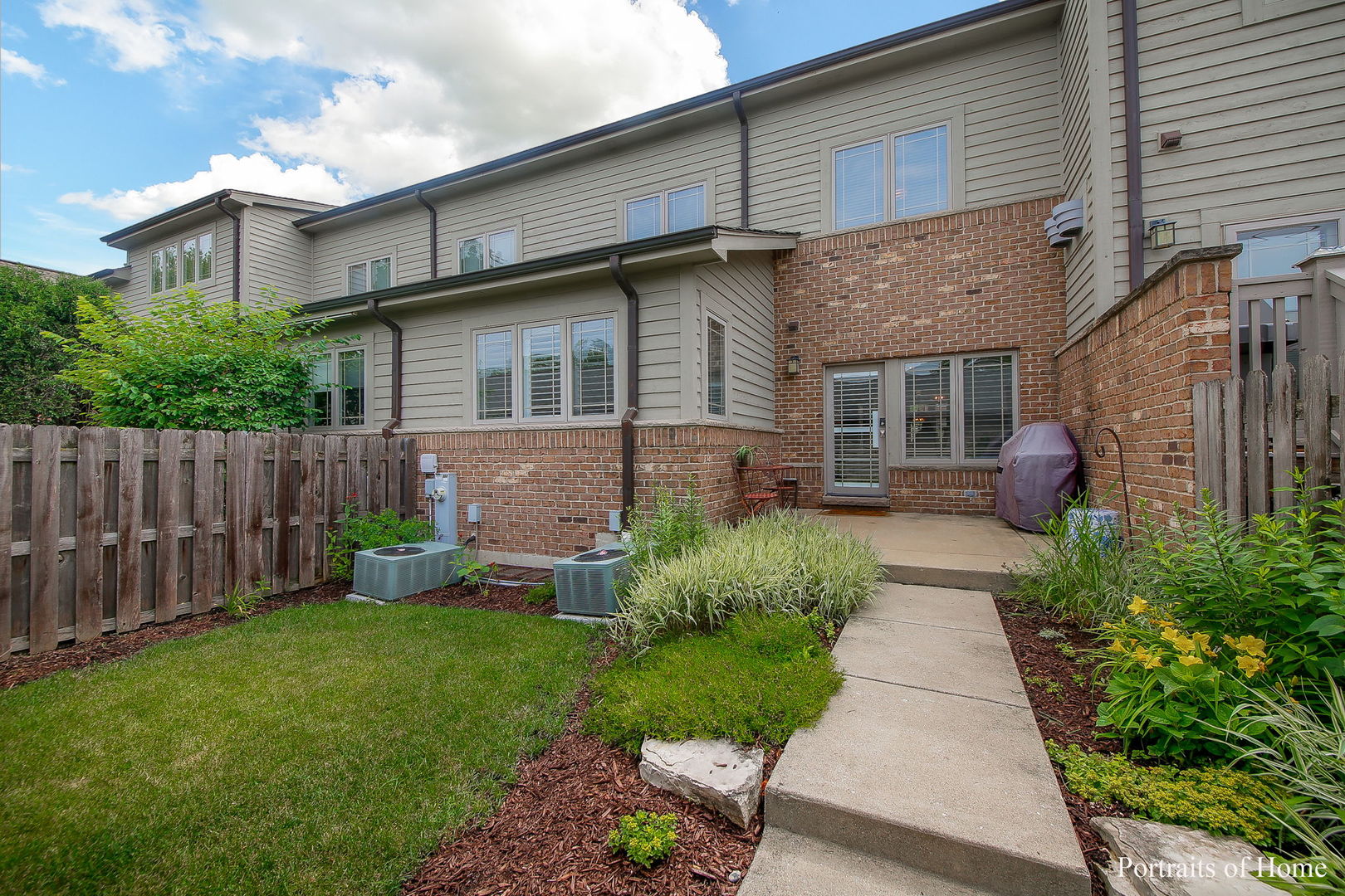 232 North Addison Avenue Elmhurst, IL 60126 - Photo 22 of 28 a front view of a house with garden