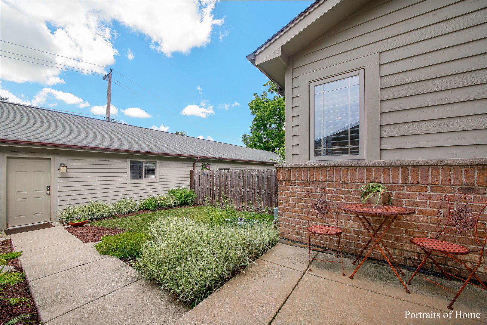 232 North Addison Avenue Elmhurst, IL 60126 - Photo 23 of 28 a front view of a house with garden
