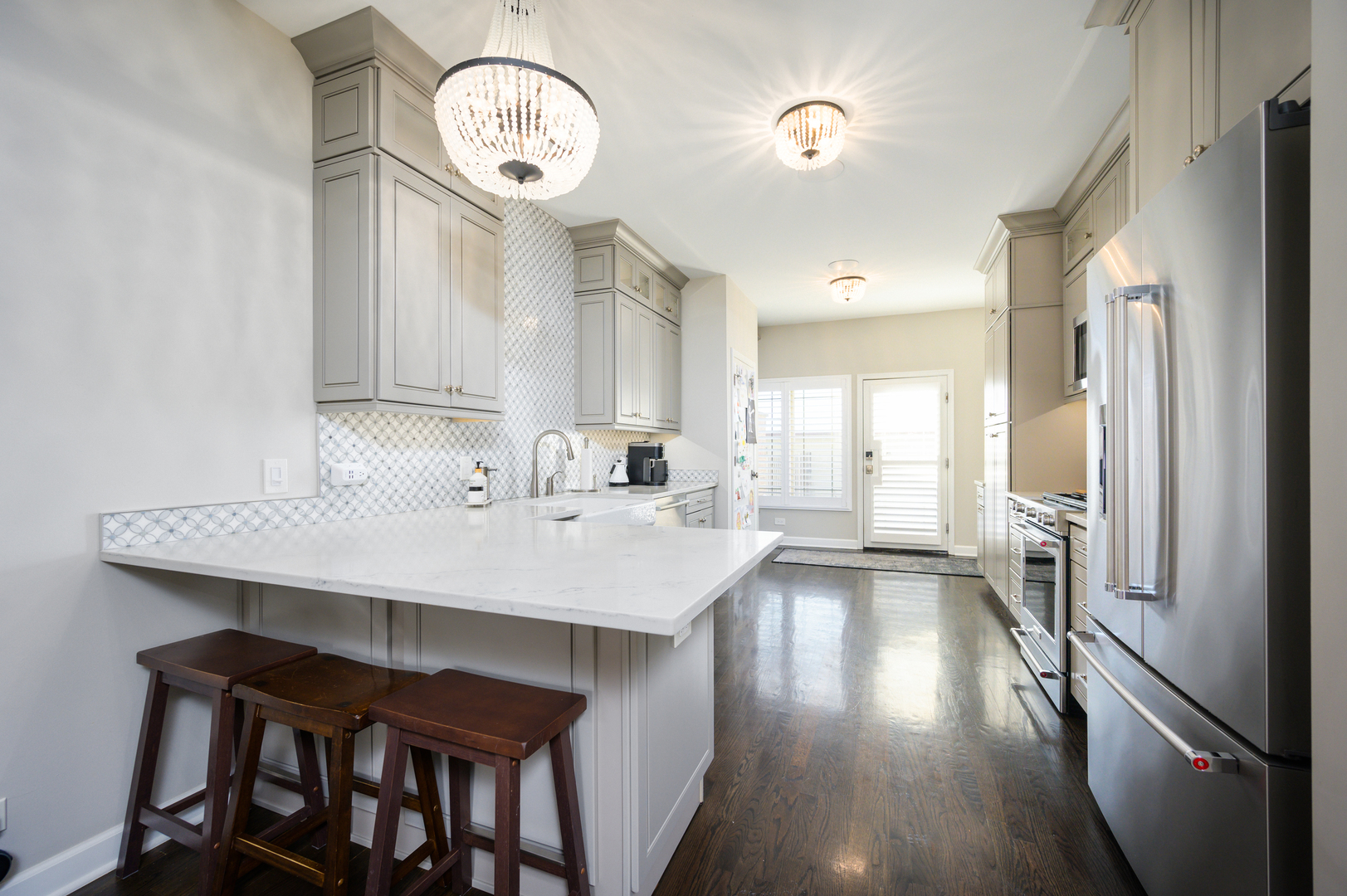 232 North Addison Avenue Elmhurst, IL 60126 - Photo 5 of 28 a kitchen with a table and chairs