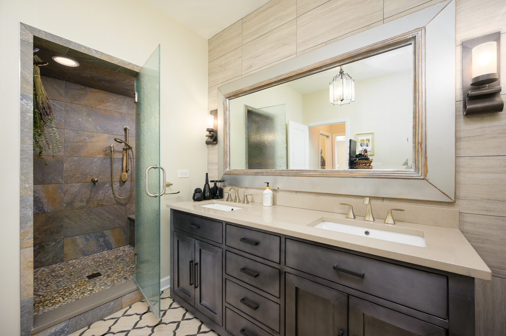 232 North Addison Avenue Elmhurst, IL 60126 - Photo 9 of 28 a bathroom with a shower sink vanity and mirror