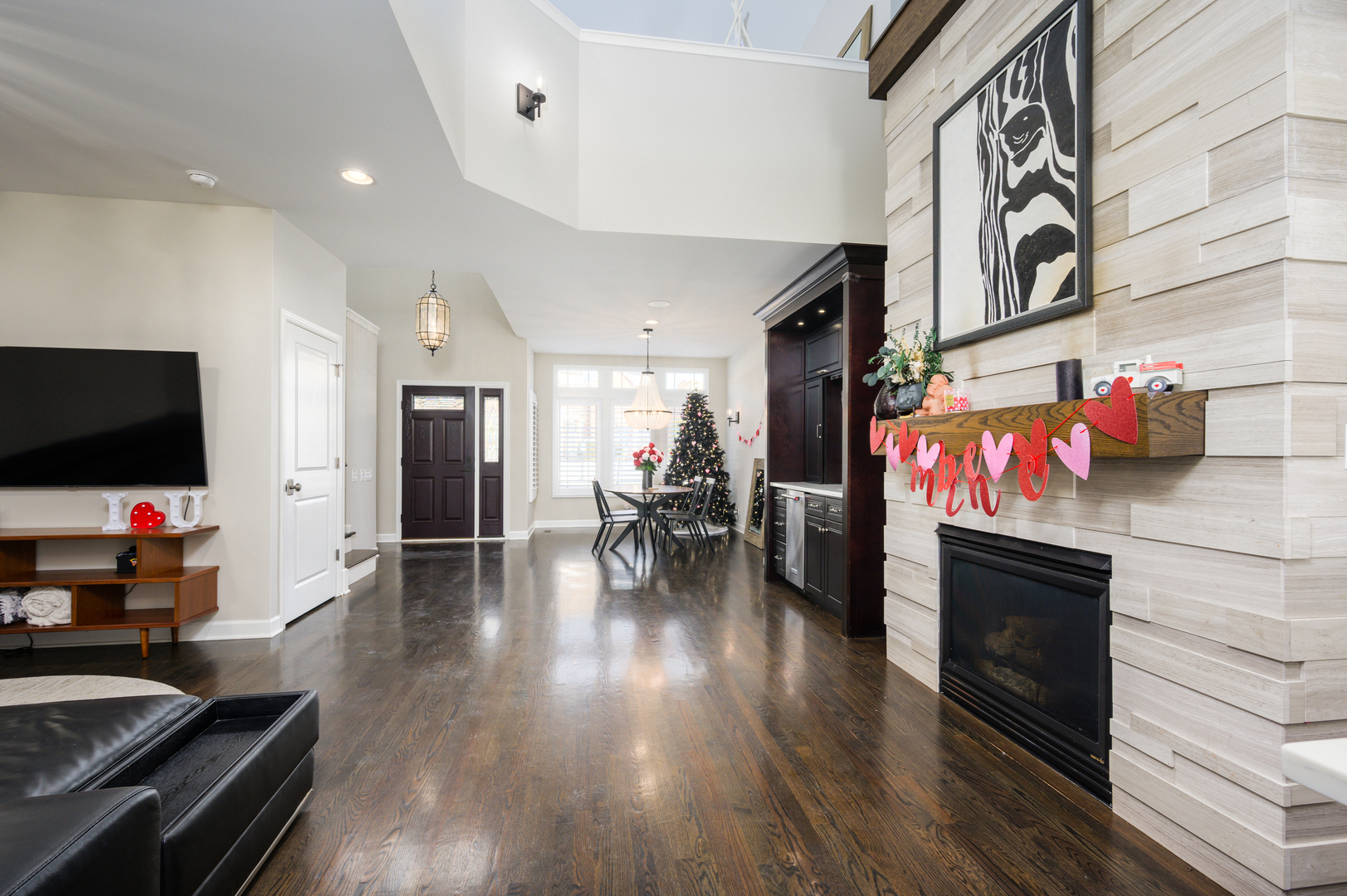 232 North Addison Avenue Elmhurst, IL 60126 - Photo 10 of 28 a living room with furniture and a flat screen tv