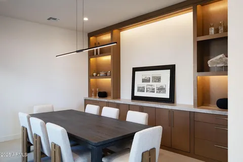 a view of a dining room with furniture