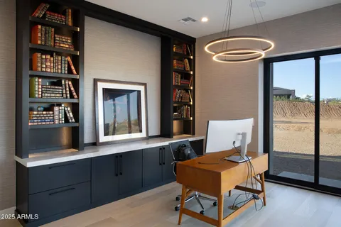 a room with furniture and a potted plant