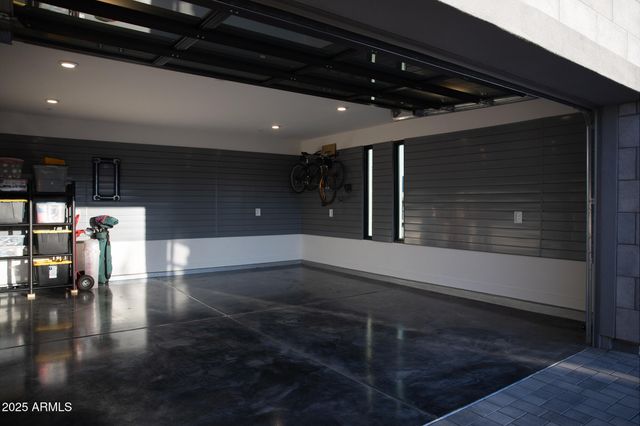 a view of a house with potted plants