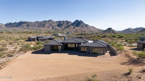 a view of a house with patio porch and furniture