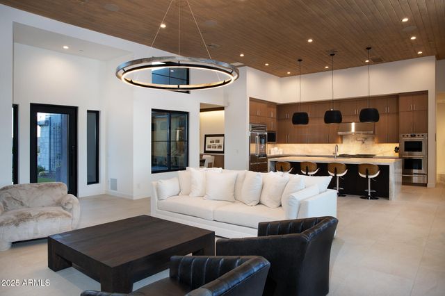 a view of houses with a table and chairs