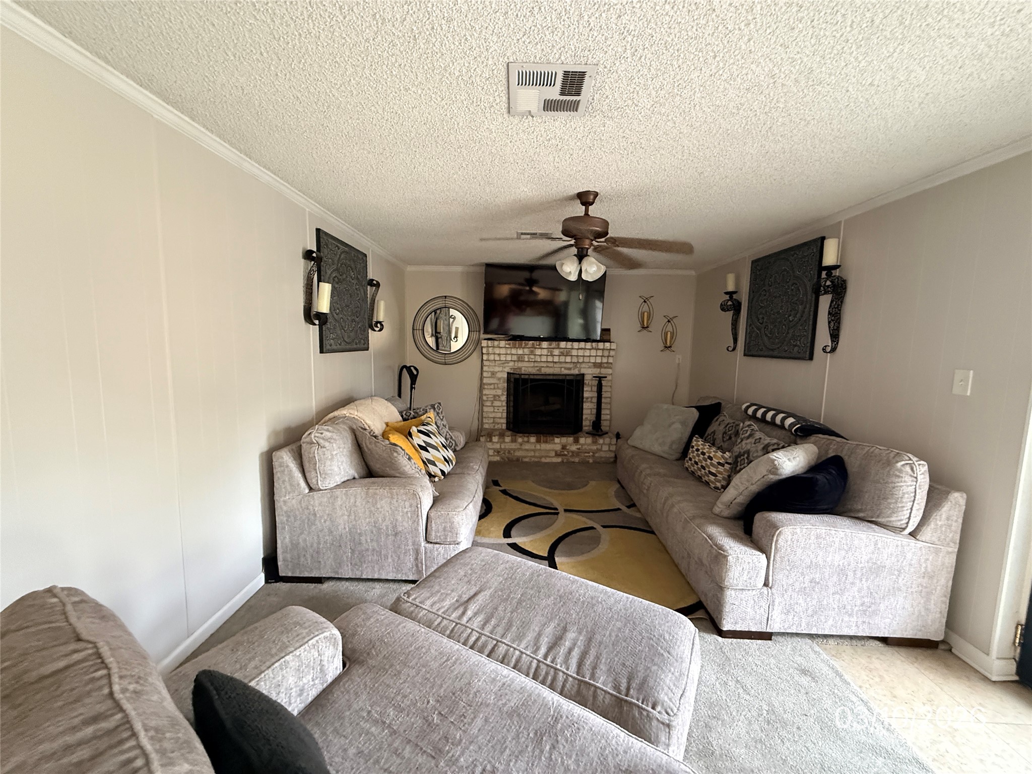 2018 Westlake Way Houston, TX 77084 - Photo 5 of 14 a living room with furniture and a fireplace