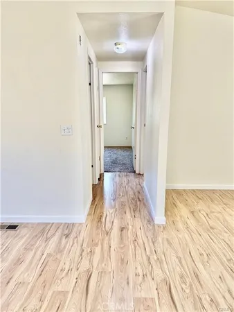 a bathroom with a shower and a sink