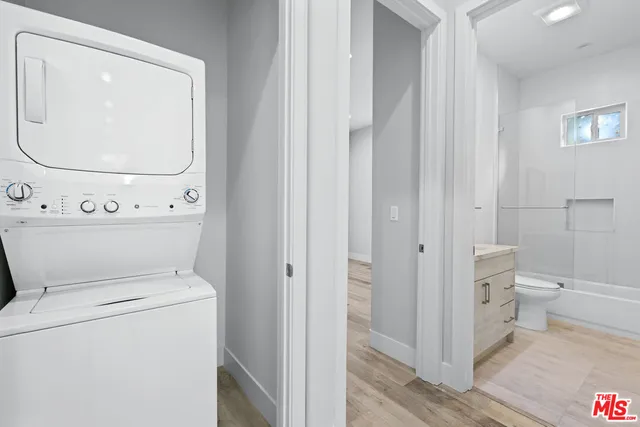 a view of bathroom with a toilet and a view of bathroom