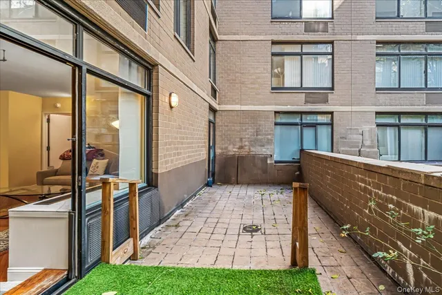 a view of house with yard