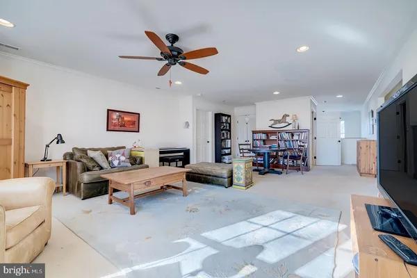 a bathroom with a sink vanity and mirror