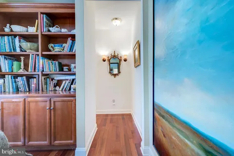 a view of a house with a patio and a yard