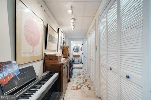 a view of a patio with swimming pool table and chairs