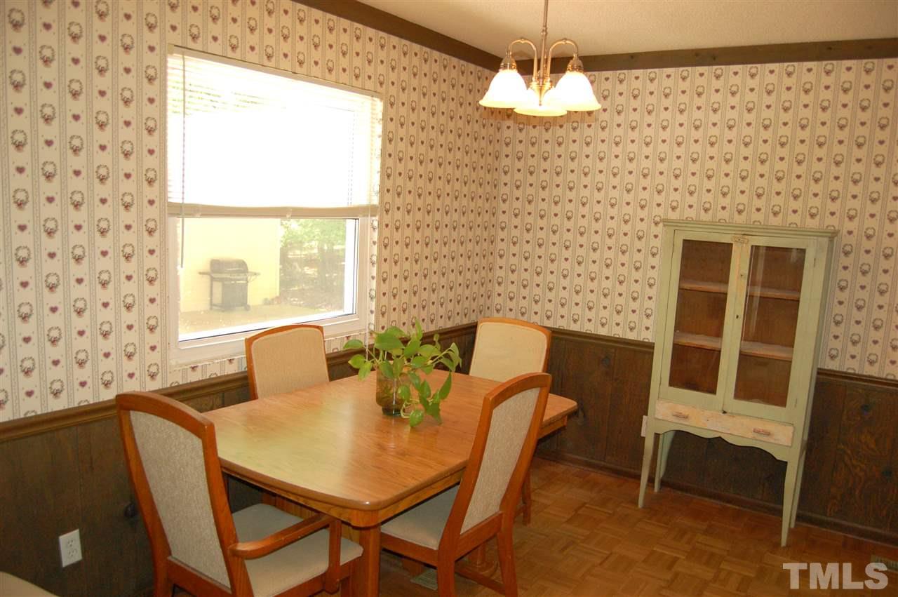 804 Valetta Road Durham, NC 27712 - Photo 11 of 28 a dining room with furniture and window