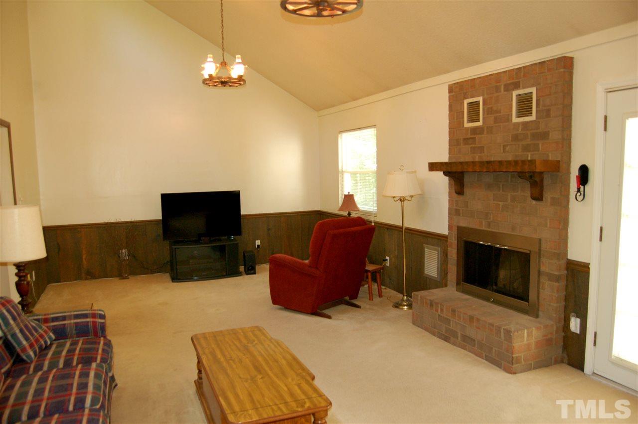 804 Valetta Road Durham, NC 27712 - Photo 15 of 28 a living room with furniture and a fireplace