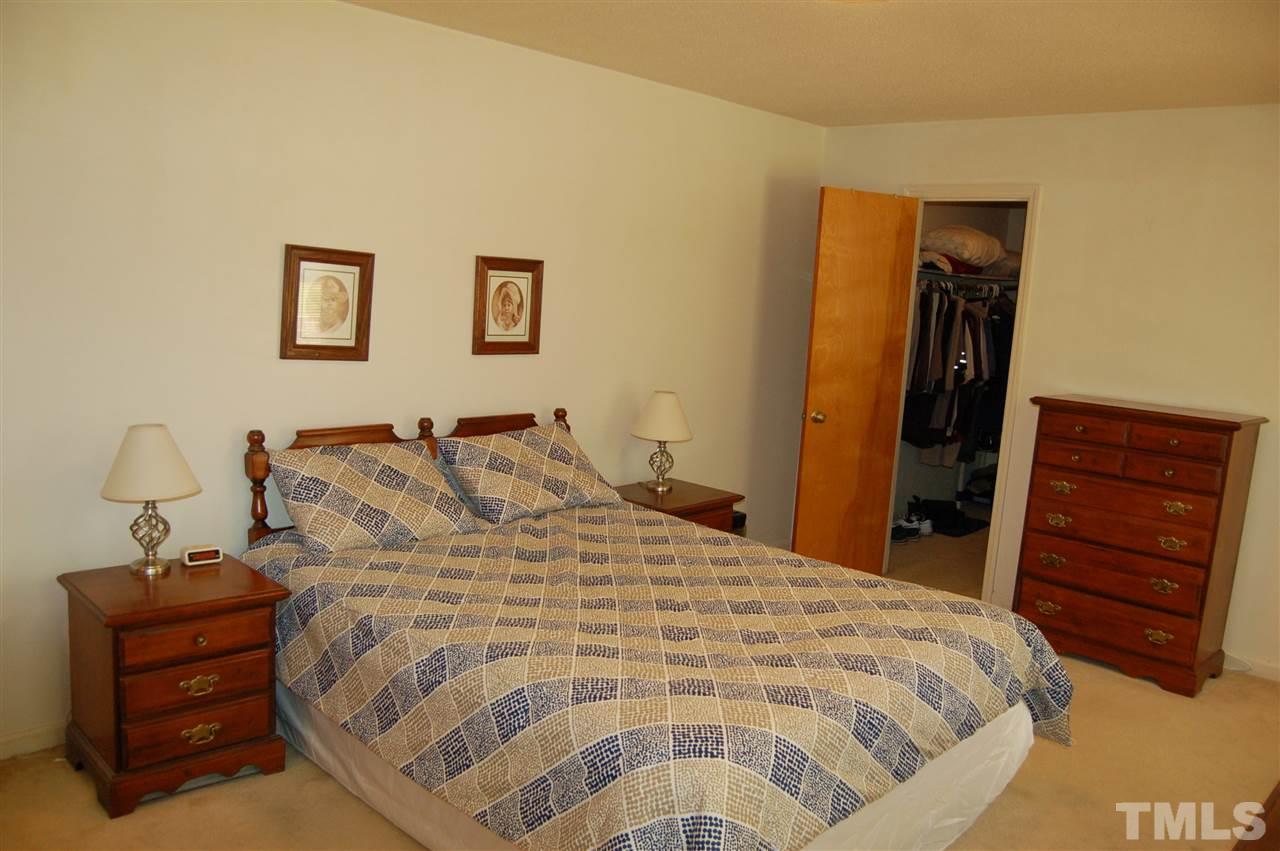 804 Valetta Road Durham, NC 27712 - Photo 17 of 28 a bedroom with a bed and a closet