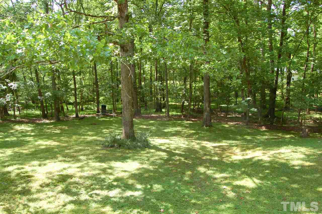 804 Valetta Road Durham, NC 27712 - Photo 5 of 28 a backyard of a house with lots of green space