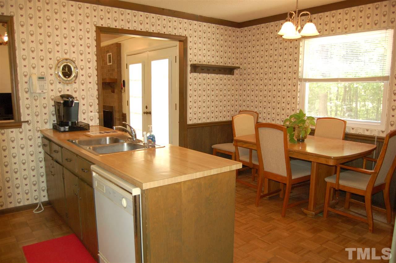 804 Valetta Road Durham, NC 27712 - Photo 8 of 28 a dining room with furniture and window