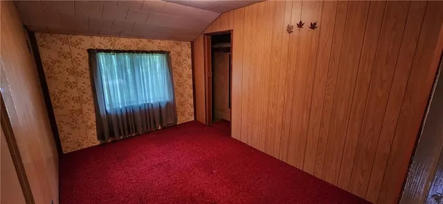 a room with furniture and a window