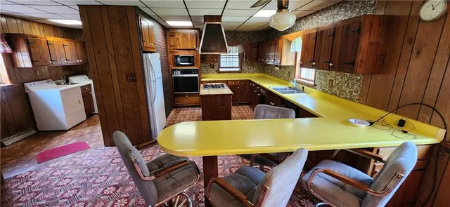 a view of a balcony with chairs