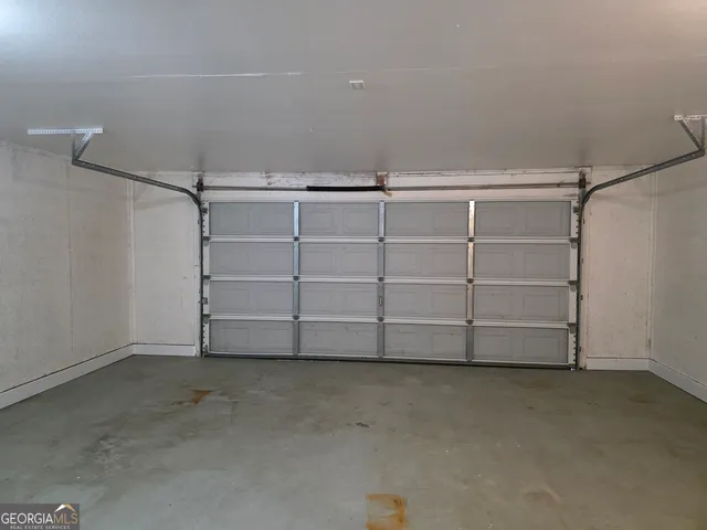 a view of a room with shelf on the wall