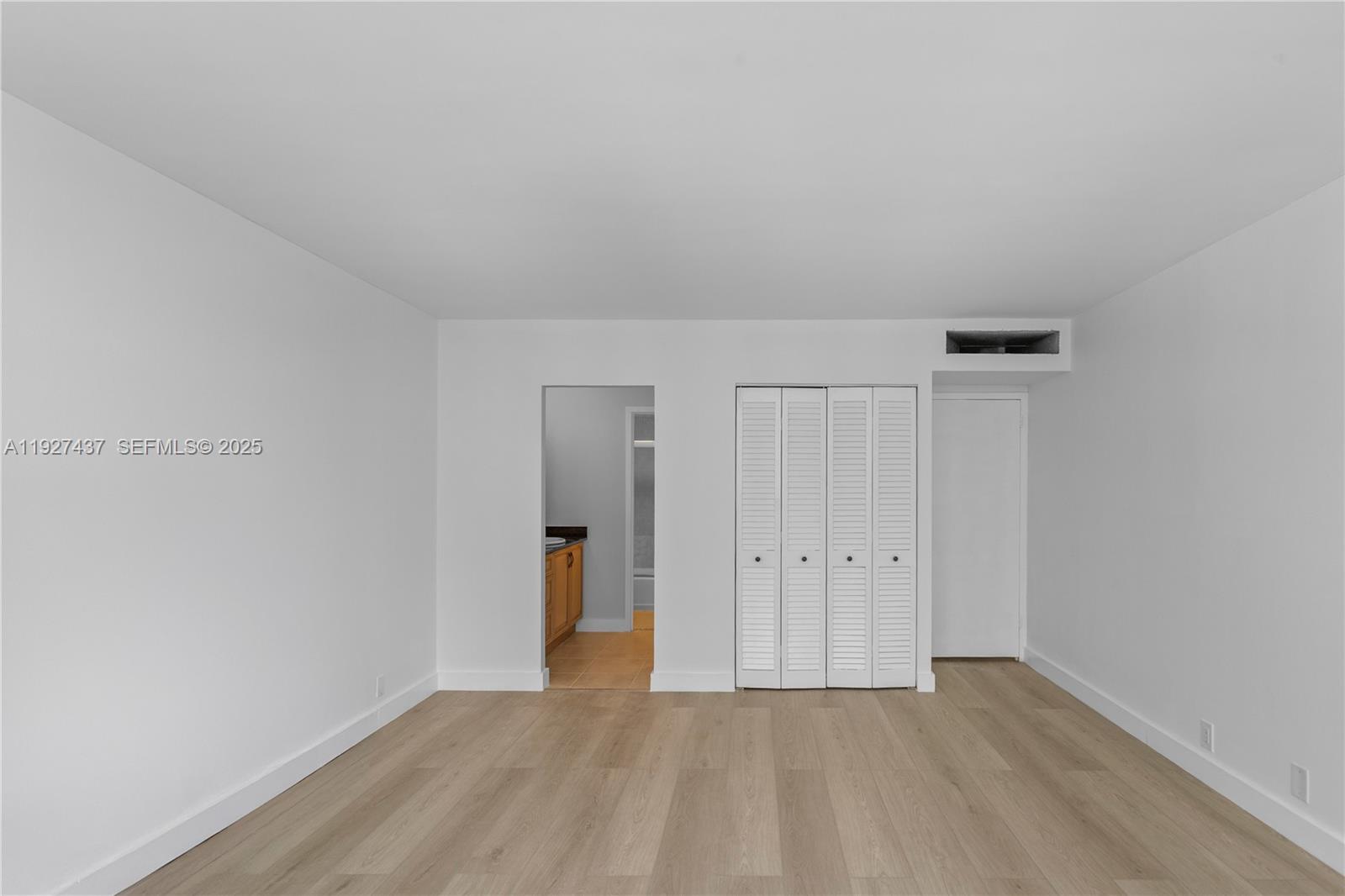 9511 Collins Avenue, Unit 806 Surfside, FL 33154 - Photo 18 of 32 a view of an empty room