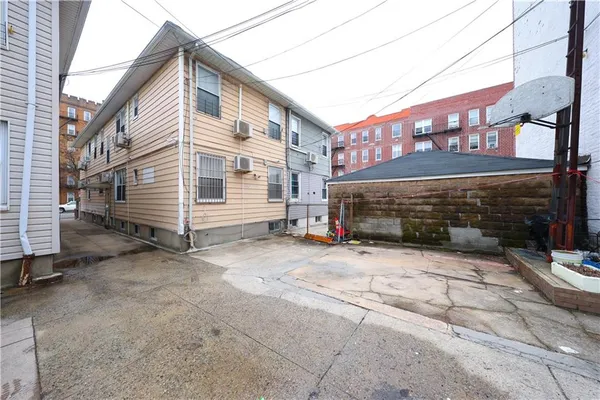 a view of a house with a street