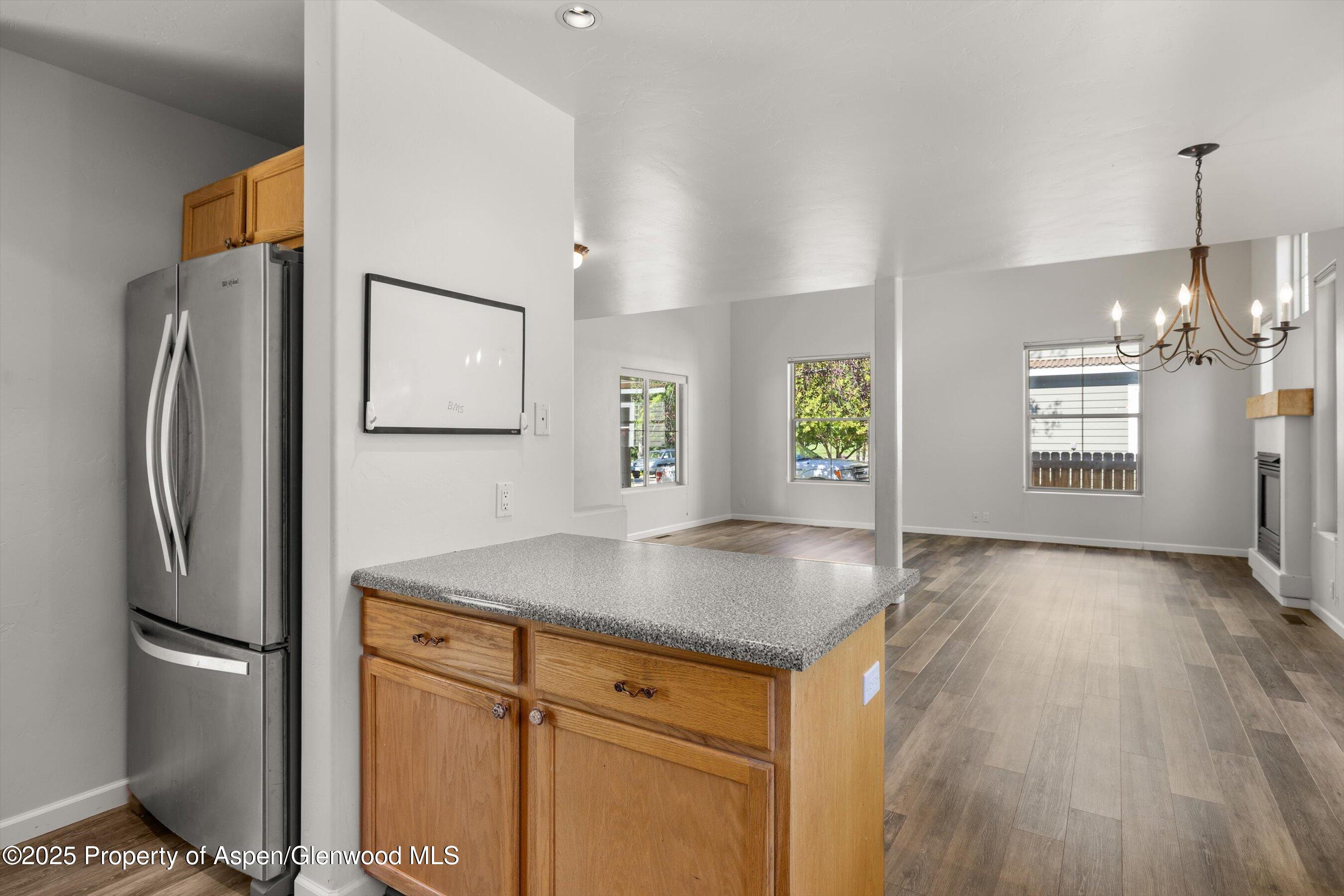 528 Lake Court Basalt, CO 81621 - Photo 14 of 33 a kitchen with stainless steel appliances granite countertop a refrigerator a sink and a stove