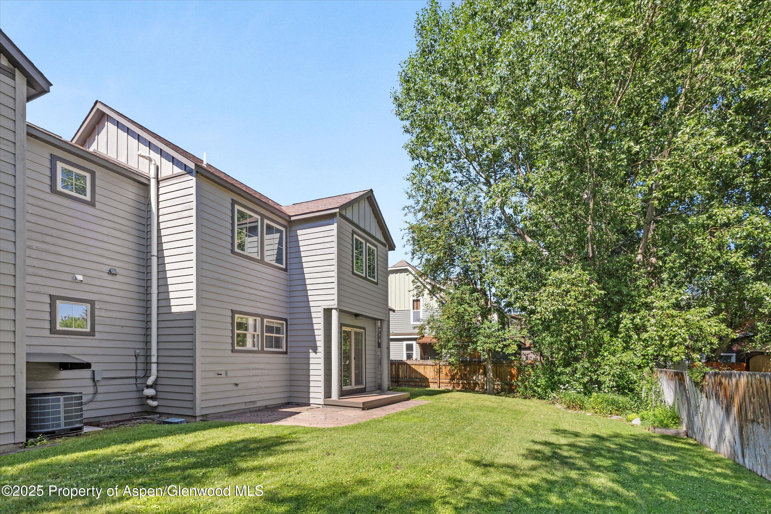 528 Lake Court Basalt, CO 81621 - Photo 31 of 33 a view of a house with a yard