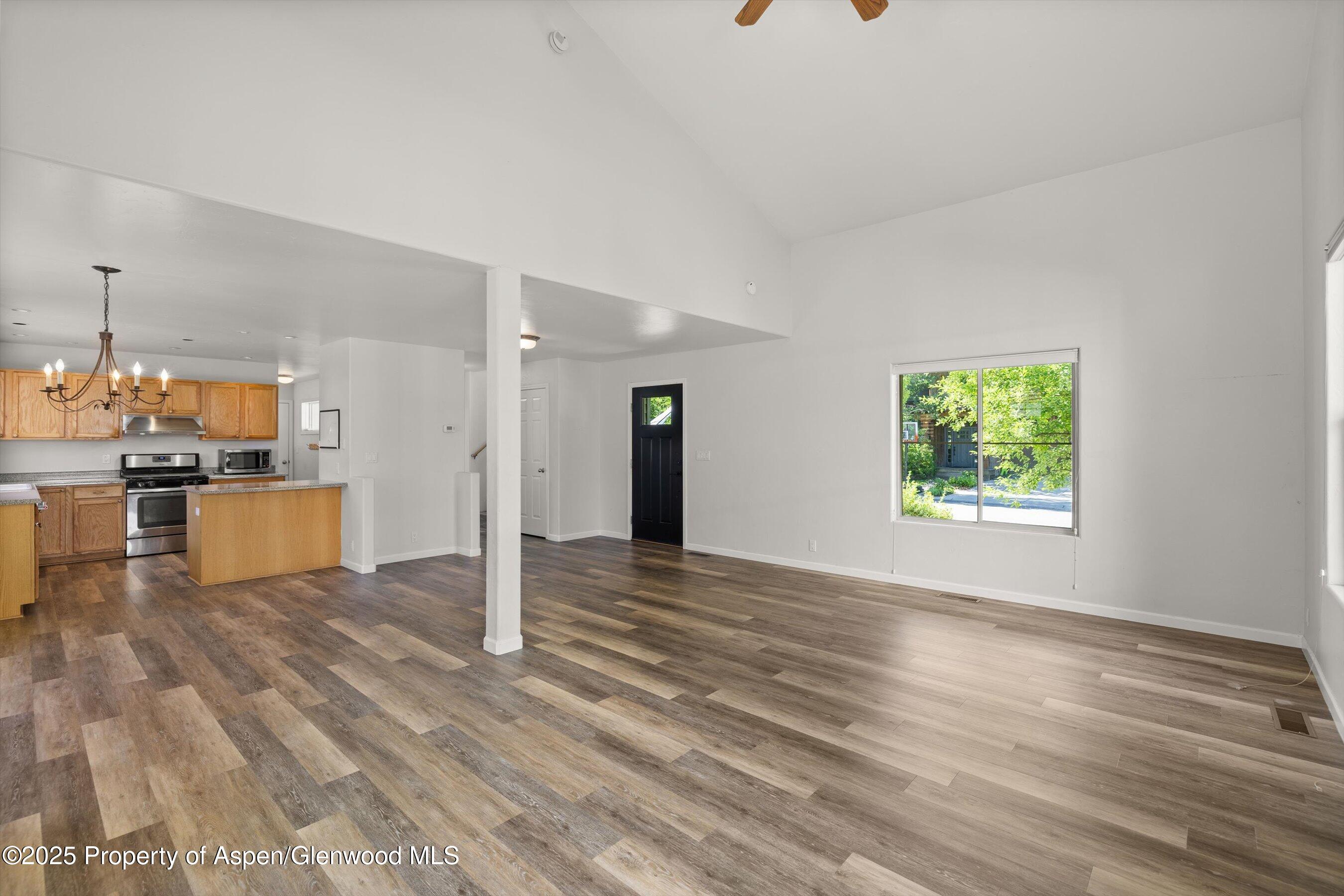 528 Lake Court Basalt, CO 81621 - Photo 9 of 33 a view of a kitchen with wooden floor and window